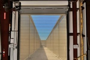 Overhead Door in Cleveland, OH with Blue Sky Shining Through 