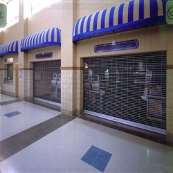 Commercial grille roll up door